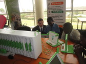 Rwandan schoolchildren using One Laptop Per Child / One Laptop Per Child (OLPC) Rwanda laptops at a booth assembled for the Kigali Public Library inauguration.