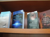 My two books -- After Genocide (co-edited with Dr. Phil Clark) and Social Entrepreneurship in the Age of Atrocities -- on display at the Kigali Public Library.